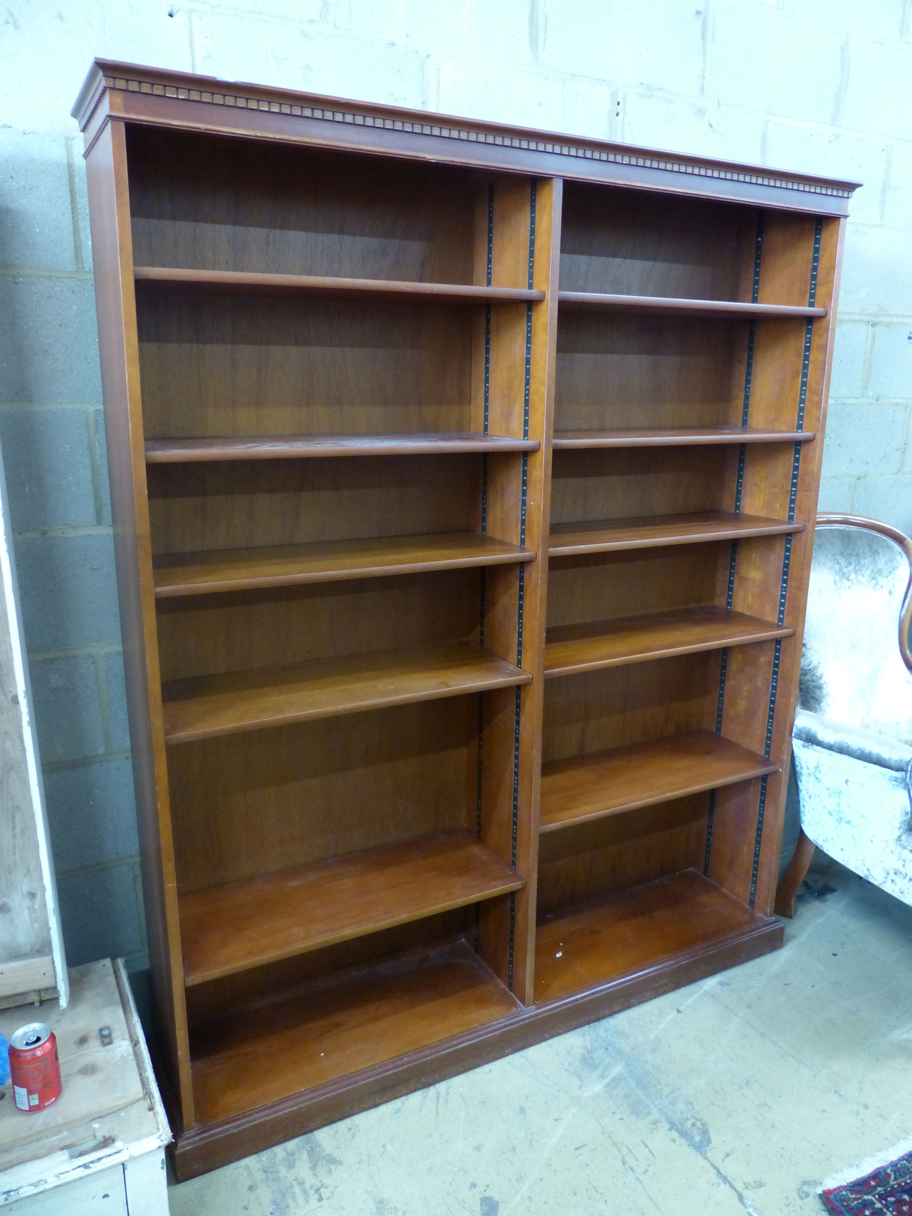 A reproduction mahogany open bookcase, width 152cm depth 30cm height 184cm